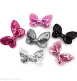 Baby haarspeldje met gltter vlinder (roze)