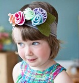 Baby stoffen haarband met gekleurde bloemen