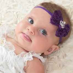 Baby haarbandje strik van roosjes met kroontje (paars)