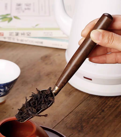 Teelöffel aus Ebenholz mit Buddha-Hand-Gravur Teelöffel aus Ebenholz mit Buddha-Hand-Gravur