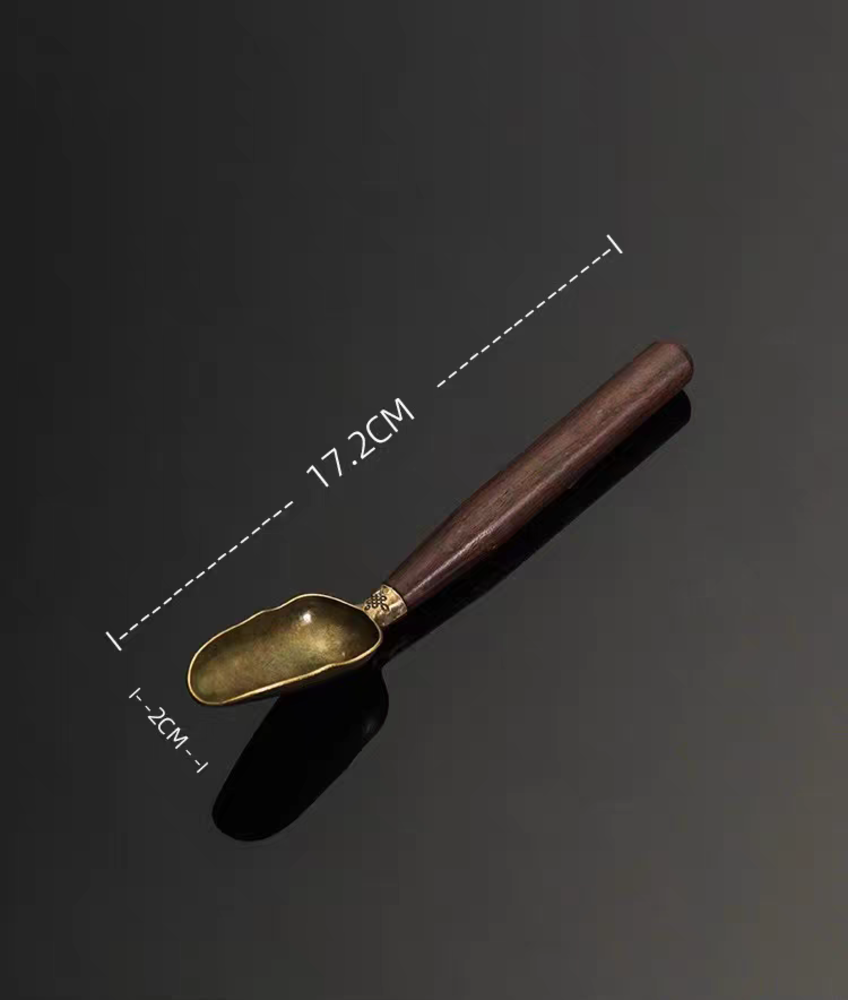 Cuillère à thé en ébène avec gravure de main de Bouddha