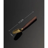 Cuillère à thé en ébène avec gravure de main de Bouddha Cuillère à thé en ébène avec gravure de main de Bouddha