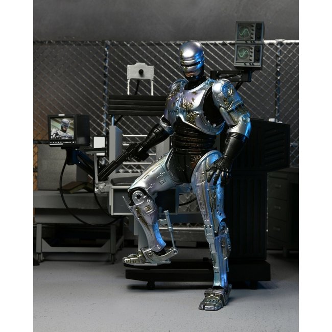 Robocop: Ultimate Battle Damaged Robocop mit Stuhl 7 Zoll Actionfigur