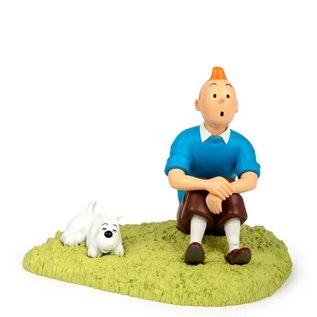 moulinsart Tintin statue - Tintin sitting on the grass