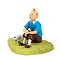 moulinsart Tintin statue - Tintin sitting on the grass