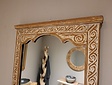 Spiegel met omlijsting van houtsnijwerk 58x142cm