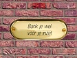 Messing label met opschrift