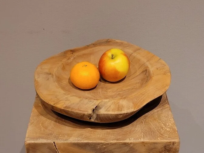 Houten fruitschaal kiezen: strak teak of organisch wortelhout?