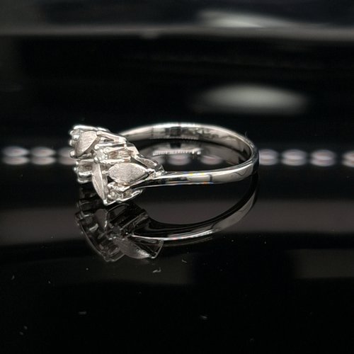 Occasion 18 krt.  witgouden ring met briljant geslepen diamanten