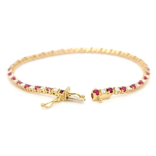 18 krt. yellow gold tennis bracelet with rubies and brilliant-cut diamonds