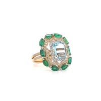 18 krt. bicolour ring with aquamarine, emeralds and brilliants
