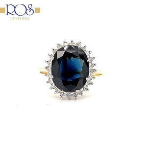 14 krt. bicolour ring met saffier en briljantgeslepen diamanten