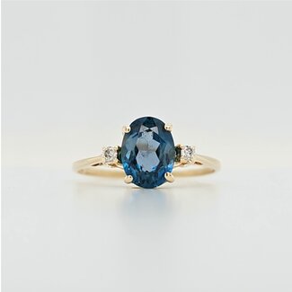 Occ 14k ring Blue Swiss Topas/brilj 1.8g mt17