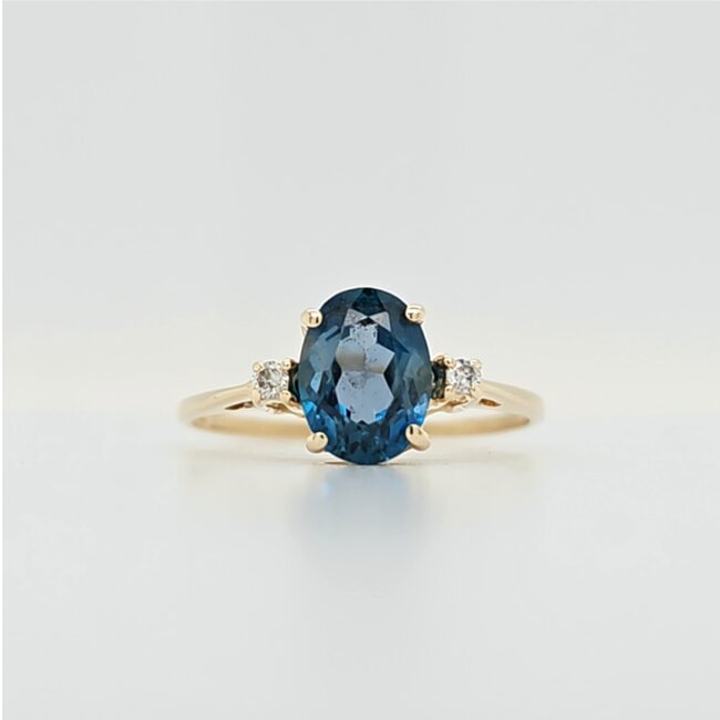 Occ 14k ring Blue Swiss Topas/brilj 1.8g mt17