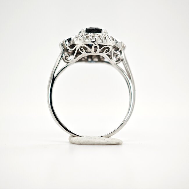 Occ 14k witgd ring Saff/0.28ct brilj 3.68g mt17