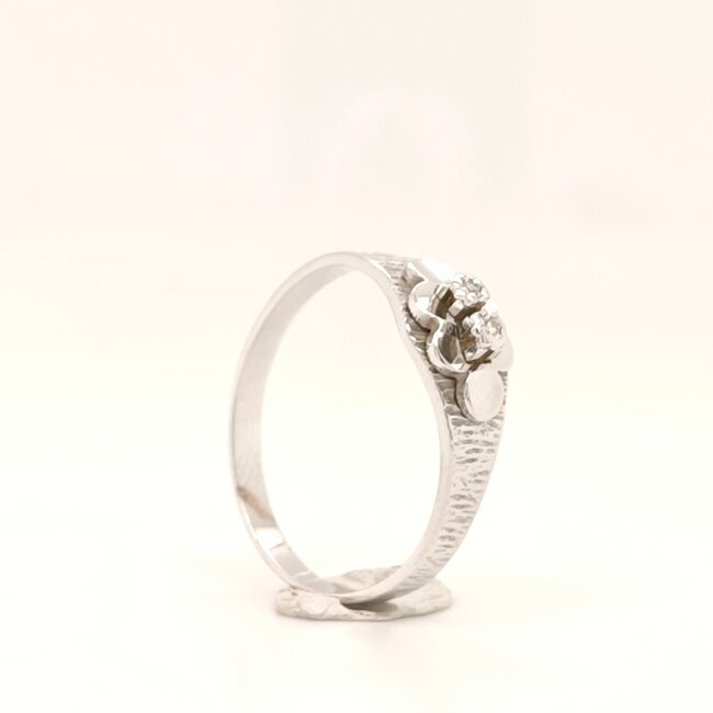 Occ 14k witgd ring met 0.02ctbrilj 2.6g mt 18.5