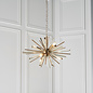 Welburn - Champagne Glass & Brass Starburst Feature Light