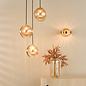 Ophira - Amber Ribbed Glass & Antique Gold Wall Light