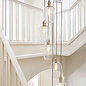 Una - Large Staircase Light - 13 Light Cascading Pendant - Antique Brass