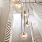 Bettina - 13 Light Cascading Staircase Pendant Chandelier - Antique Brass