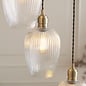 Bettina - 7 Light Cascading Staircase Pendant Chandelier- Antique Brass