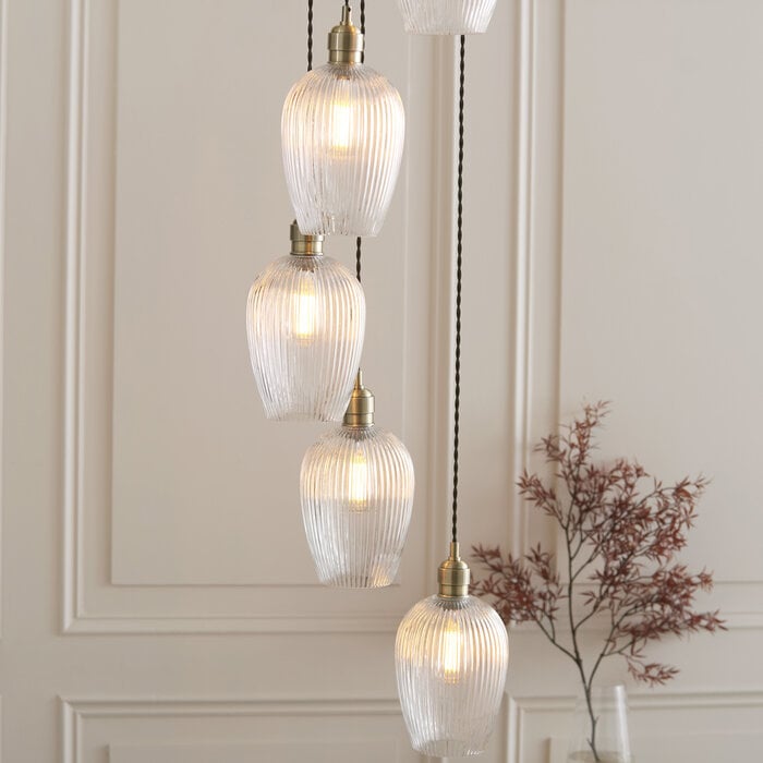 Bettina - 7 Light Cascading Staircase Pendant Chandelier- Antique Brass