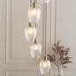 Bettina - 7 Light Cascading Staircase Pendant Chandelier- Antique Brass