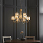 Berenice 9 light tiered chandelier pendant - brass and glass