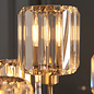 Berenice 9 light tiered chandelier pendant - brass and glass
