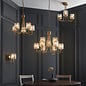 Berenice 9 light tiered chandelier pendant - brass and glass