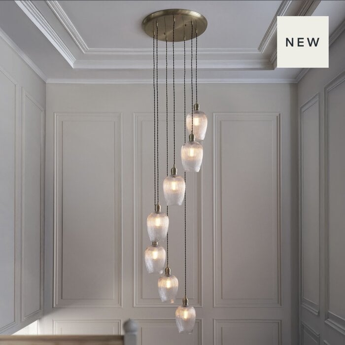 Bettina - 7 Light Cascading Staircase Pendant Chandelier- Antique Brass