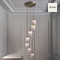 Bettina - 7 Light Cascading Staircase Pendant Chandelier- Antique Brass