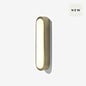 Nura Flush Bathroom Wall Light in Brass - MADE