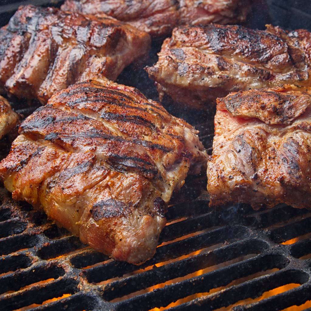 Gegaarde spareribs in barbecuesaus (lat van +/- 750g )