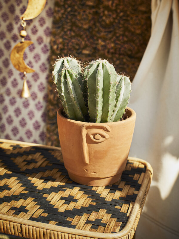 Madam Stoltz Terracotta Flower Pot Face 2. A flower pot with a beautiful plant in it brightens up your interior completel...