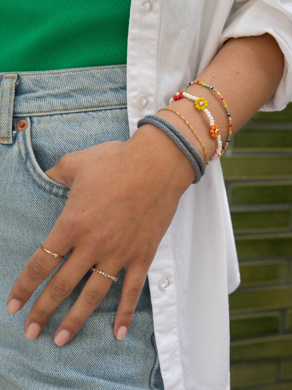 Les Soeurs Bracelet Feliz Love 2. Colorful and gold-colored beads make this bracelet a lively, playful piece that can be ...