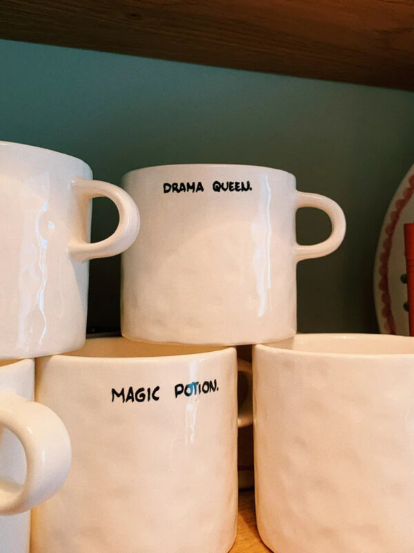 Anna + Nina Mug Drama Queen 2. The Drama Queen Mug is made of ceramic. This mug is for anyone who likes to sink into thou...