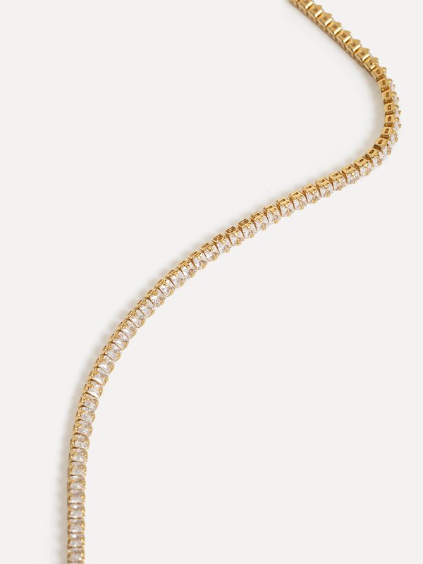 Les Soeurs Tennis Bracelet Bovi 5. Everyone loves a gold-dipped tennis bracelet. This dainty bracelet has a string of zir...