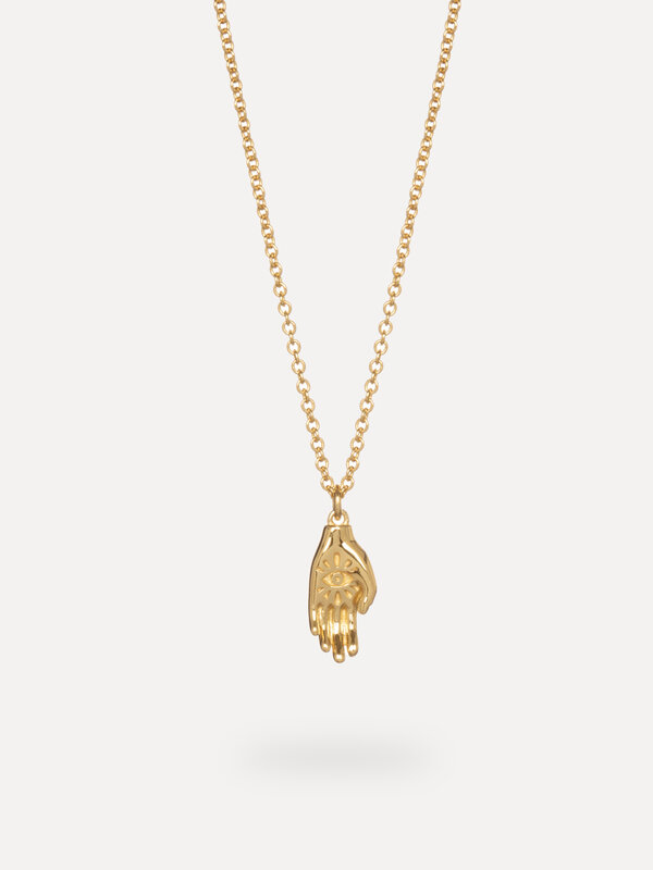 Les Soeurs Necklace Roma Hand 4. This gold necklace has a touch of sparkle in an elegant hand pendant, with a stoic, spir...