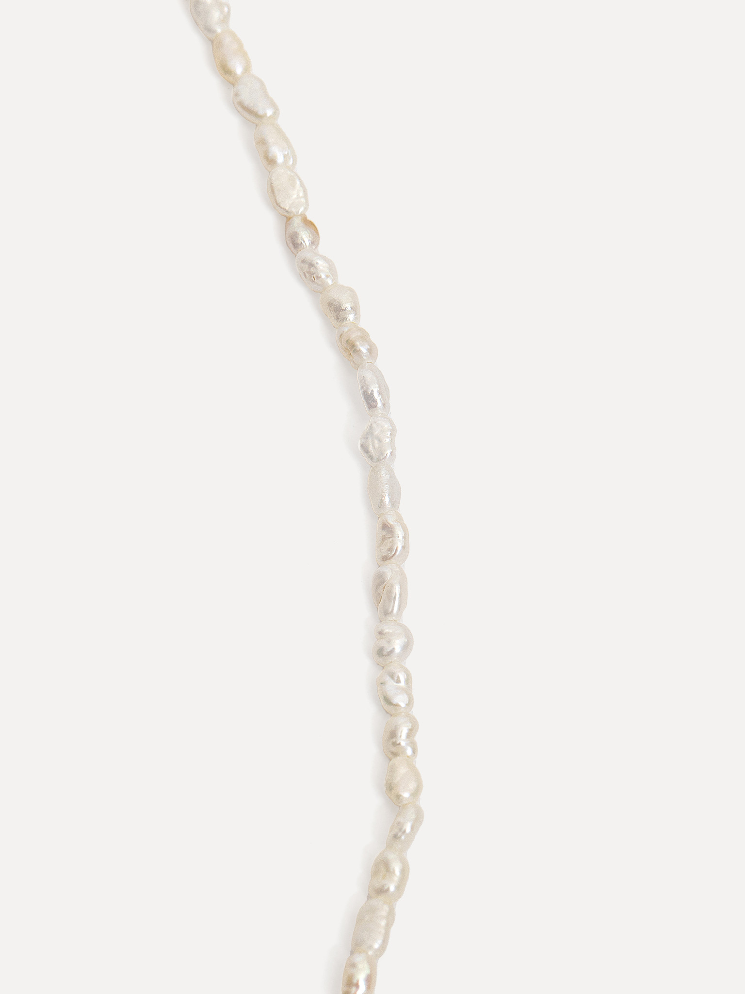 Les Soeurs Necklace Rayan 4. An elegant strand of fine imitation pearls makes up this classic necklace. A dreamy look for...