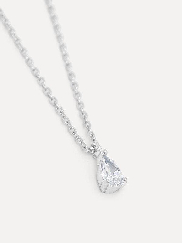 Les Soeurs Necklace Romee Extra Fine Chain Pear 4. The delicate pendant with a pear-shaped zirconia gemstone set in prong...