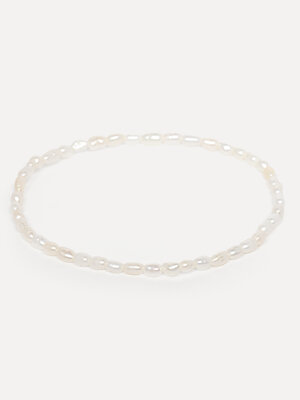 Bracelet Fira. This bracelet with fine imitation pearls is a charming and easy accessory to add to any look this summer.