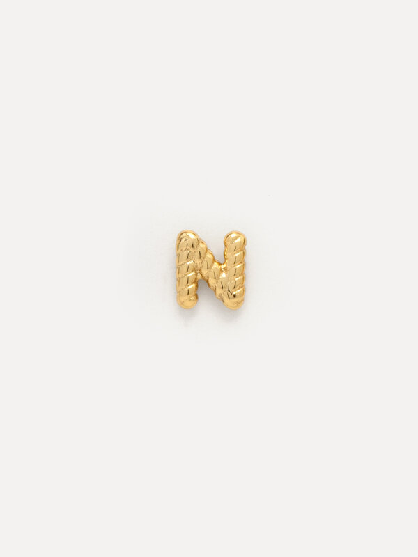 Les Soeurs Jolie Twisted Initial 1. Classics with a personal twist. Make your jewelry unique with this twisted stud earri...