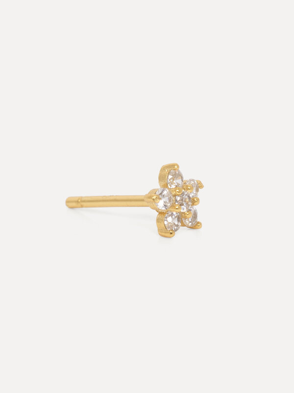 Les Soeurs Boucle d'oreille Jolie Fleur Strass 1. Ces délicates boucles d'oreilles au design floral étincelant sont intem...