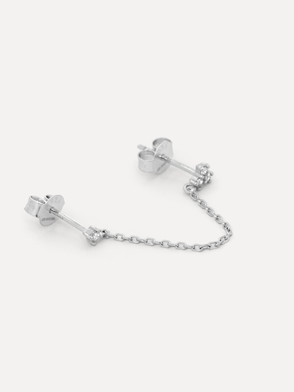 Les Soeurs Lira Double Stud Chain 4. Add a touch of sophistication to your everyday outfit with this dainty chain earring...