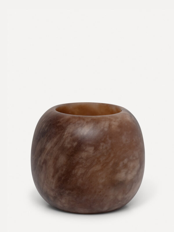 Les Soeurs Round Alabaster tea light holder (large) 3. Add ambiance to your interior with this round candle holder. Handc...