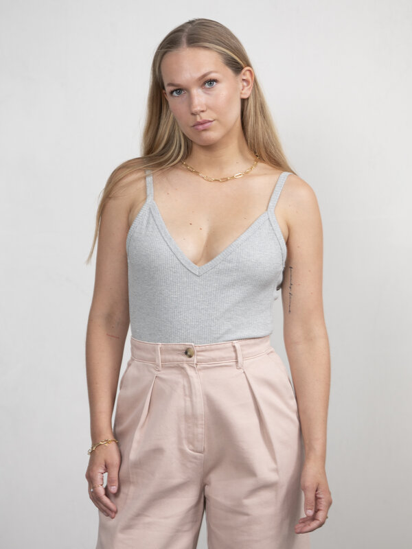 The Odder Side Ribbed Body Emi 1. The Emi bodysuit is a wardrobe staple during the summer months. The form-fitting piece ...