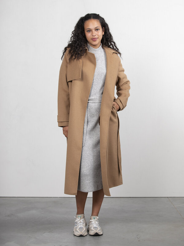 Edited Wool Trenchcoat Julianne 1. An iconic silhouette meets the ultimate cold-weather material in this trench coat. Thi...