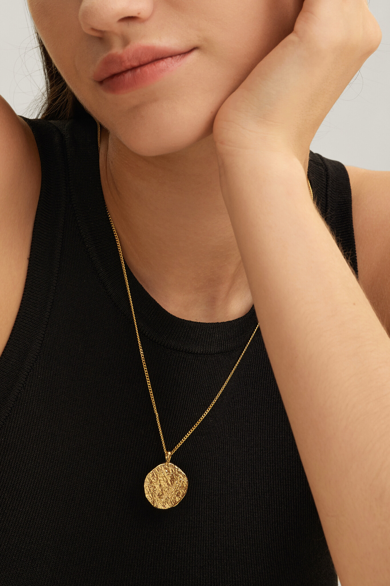 Les Soeurs Necklace Rana Amulet 3. Inspired by natural shapes, this organic coin necklace has a robust texture. Wear this...