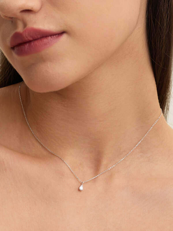 Les Soeurs Necklace Romee Extra Fine Chain Pear 3. The delicate pendant with a pear-shaped zirconia gemstone set in prong...